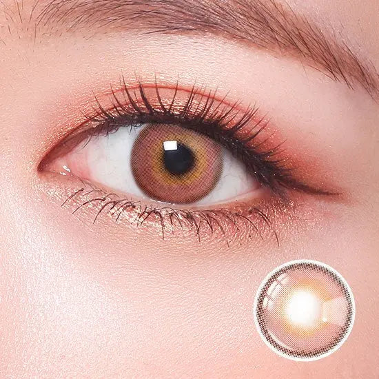 Close-up shot of an eye wearing Say Yes Idol Red lenses, highlighting the vibrant red tones and warm, natural-looking design.