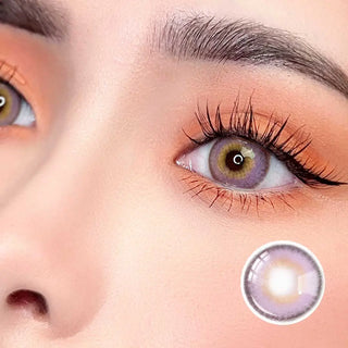 Zoomed-in view of a model wearing Say Yes Nightout Violet lenses, emphasizing their vibrant purple hue and details.